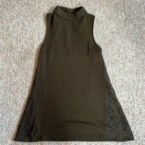 Dark green candies, sleeveless top